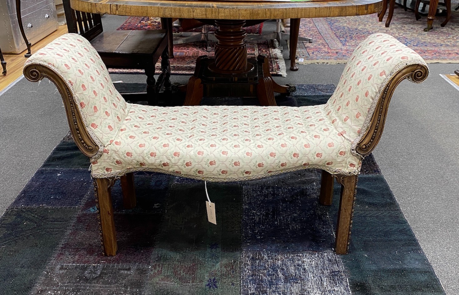 A George III mahogany framed serpentine window seat, c.1780, width 110cm, height 66cm